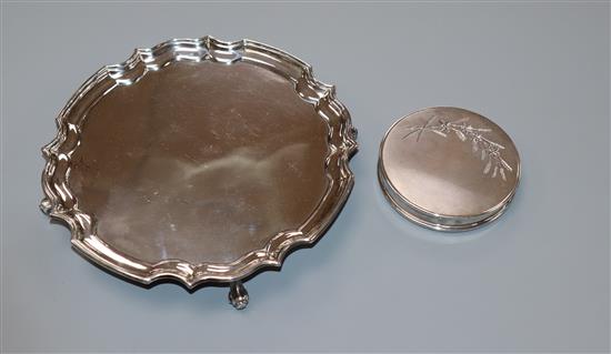 A 1950s silver waiter and a silver compact.